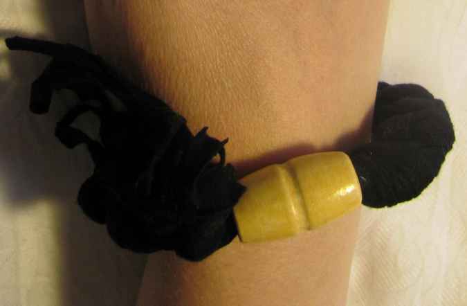 large image of art item: accessory – bracelet black bead yellow