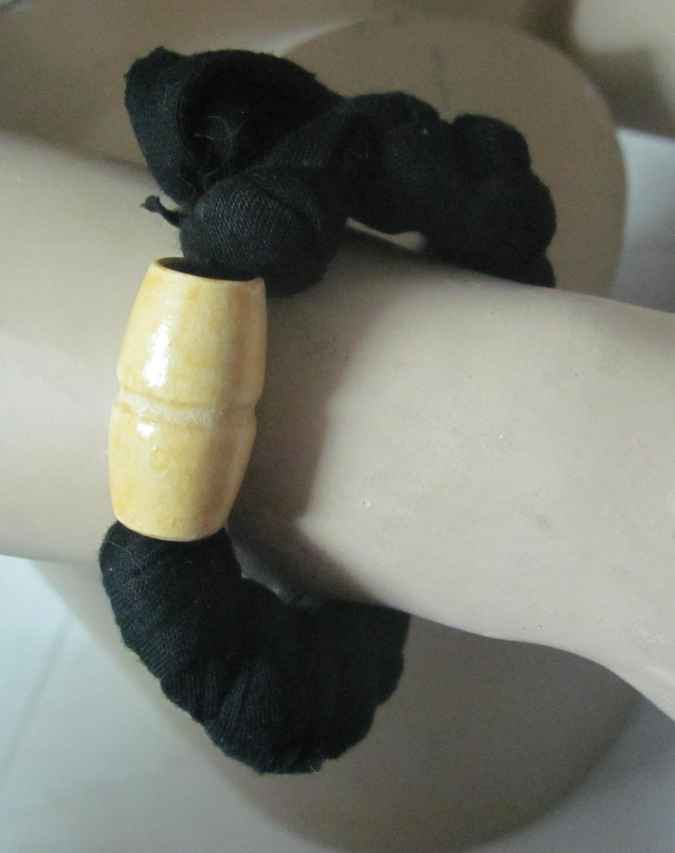 large image of art item: accessory – bracelet black bead yellow