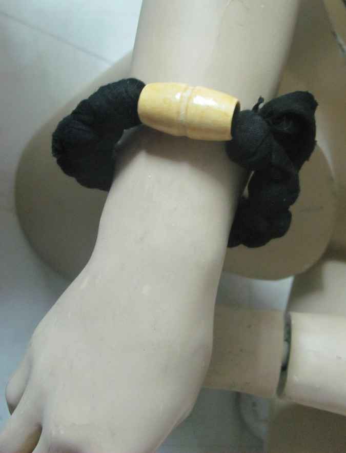 large image of art item: accessory – bracelet black bead yellow