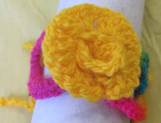 large image of art item: accessory – bracelet crochet flower yellow pink