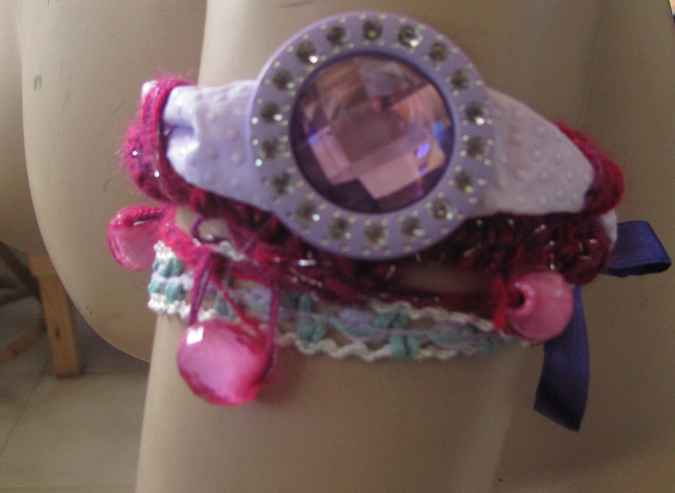 large image of art item: accessory – bracelet pink purple ribbon gem purple