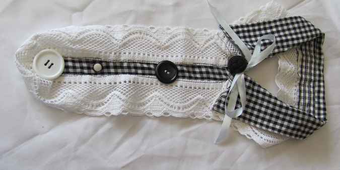 large image of art item: accessory – collar white black with button black