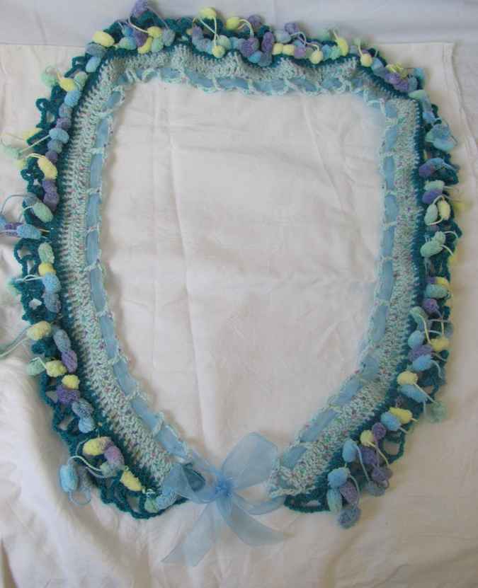 large image of art item: accessory – crochet cyan ponpons ribbon