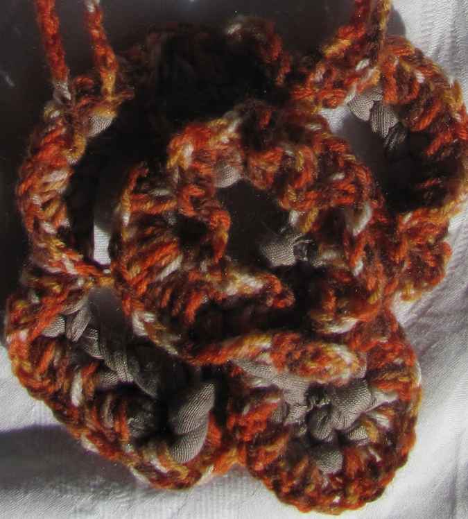 large image of art item: accessory – crochet flower orange
