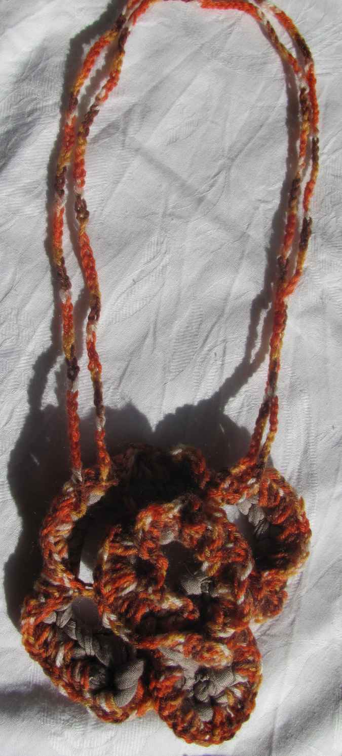 large image of art item: accessory – crochet flower orange