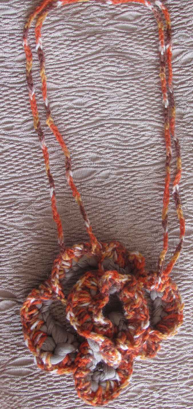 large image of art item: accessory – crochet flower orange