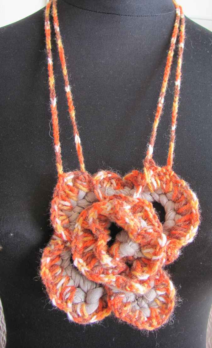 large image of art item: accessory – crochet flower orange