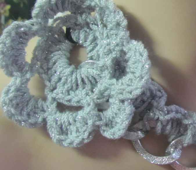 large image of art item: accessory – crochet neck flower violet