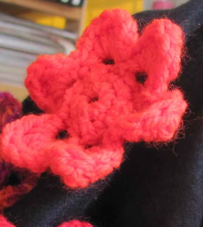 large image of art item: accessory – black hat/scarf with red crochet flowers