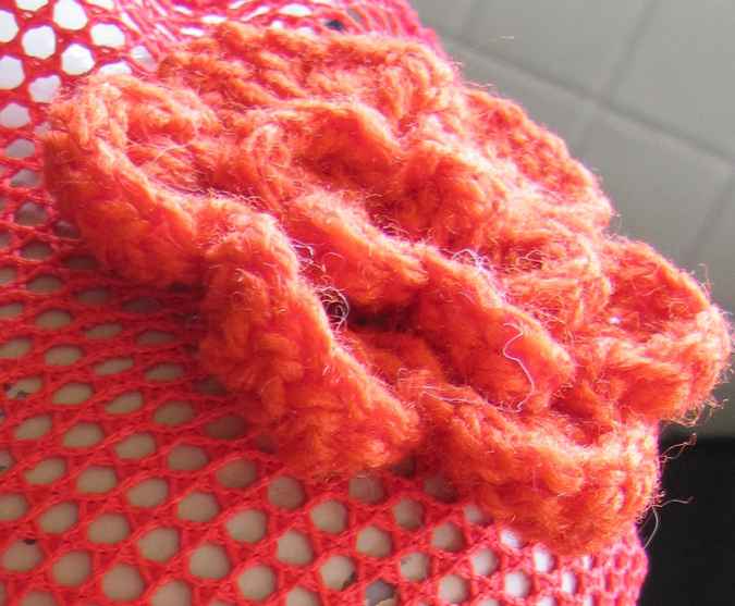 large image of art item: accessory – hat red crochet flower