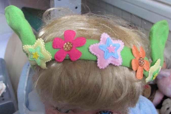large image of art item: accessory – head decoration green flowers