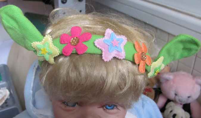 large image of art item: accessory – head decoration green flowers