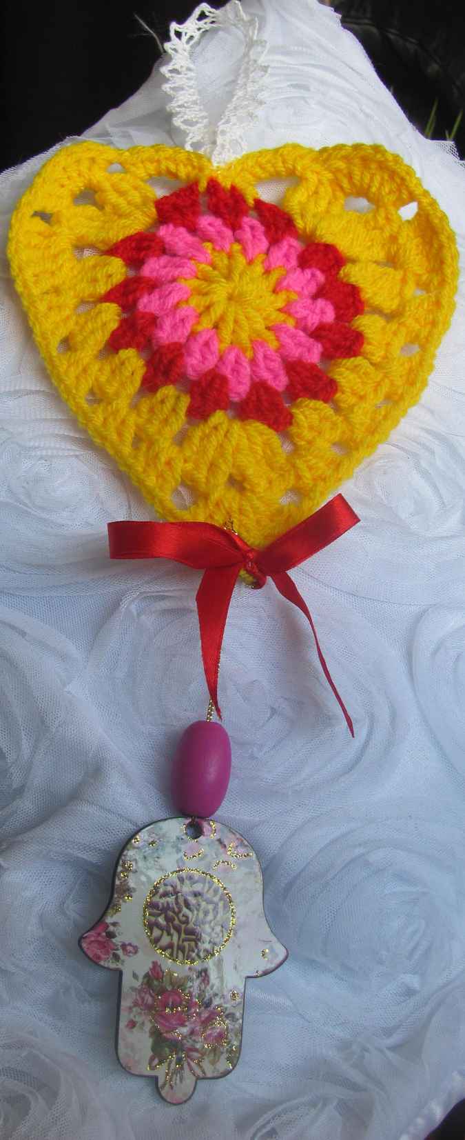 large image of art item: accessory – heart yellow hamsa
