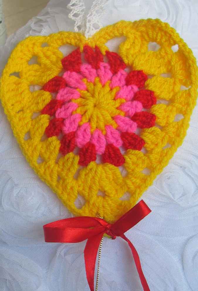 large image of art item: accessory – heart yellow hamsa