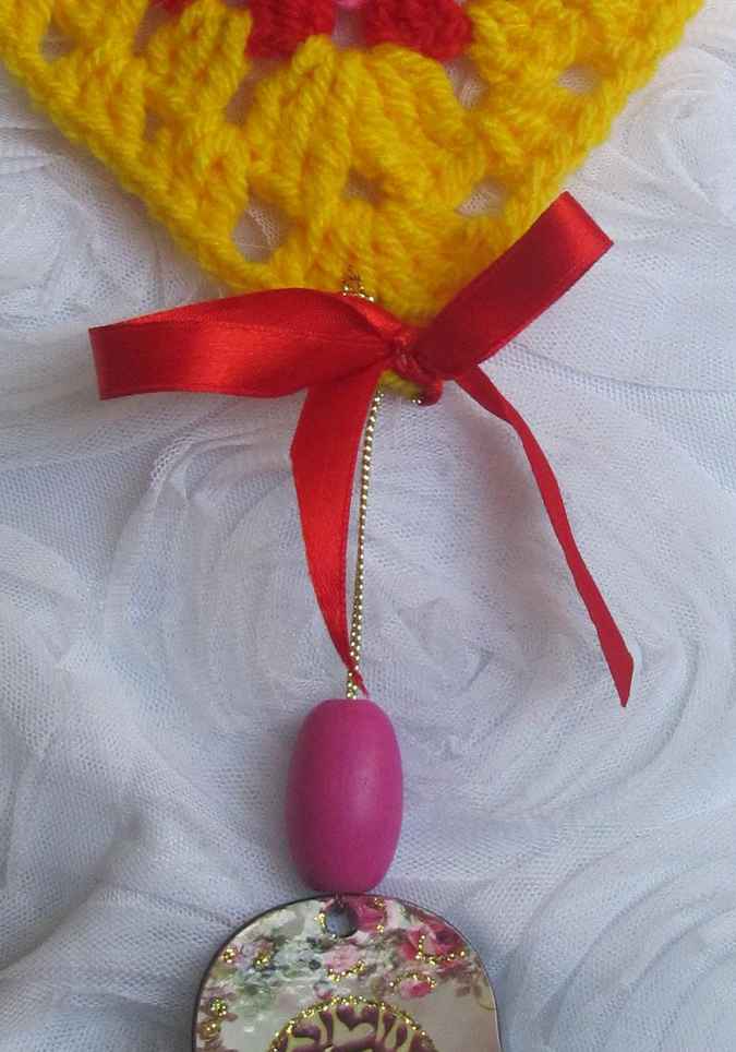 large image of art item: accessory – heart yellow hamsa