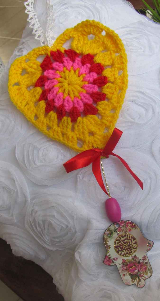large image of art item: accessory – heart yellow hamsa