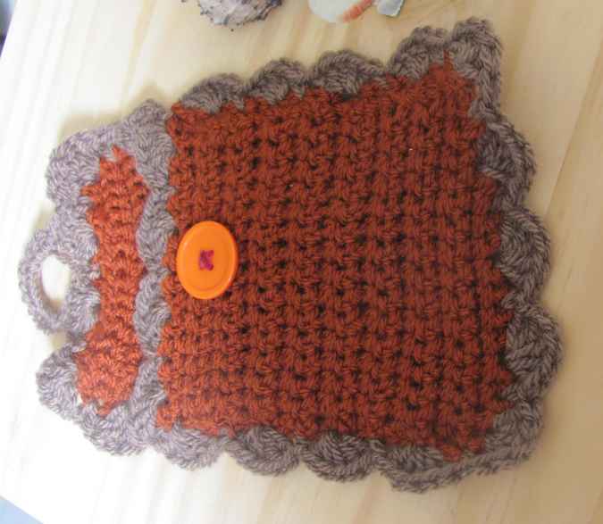 large image of art item: accessory – cell phone pocket brown gray button orange