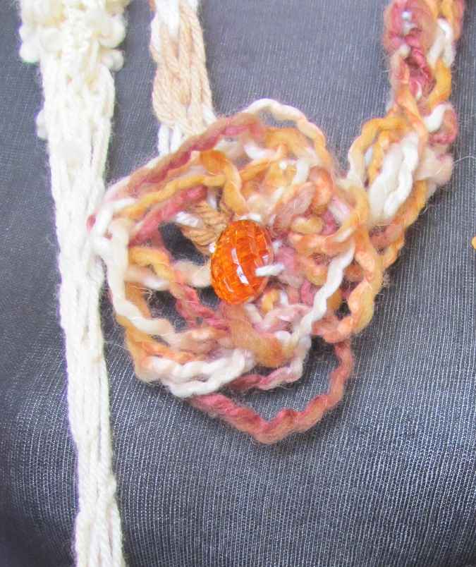 large image of art item: accessory – necklace crochet orange white flower animals wooden