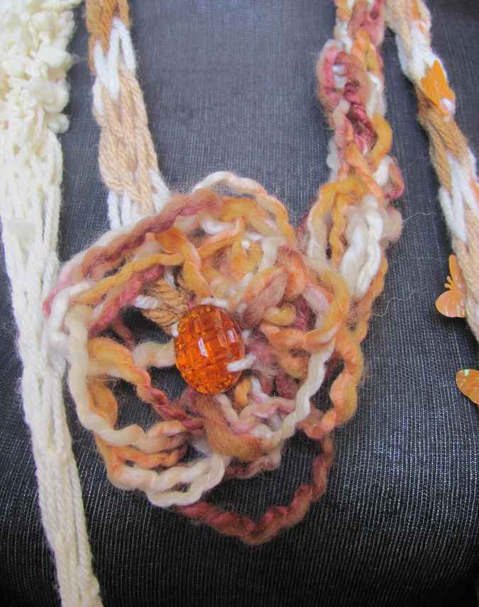 large image of art item: accessory – necklace crochet orange white flower animals wooden
