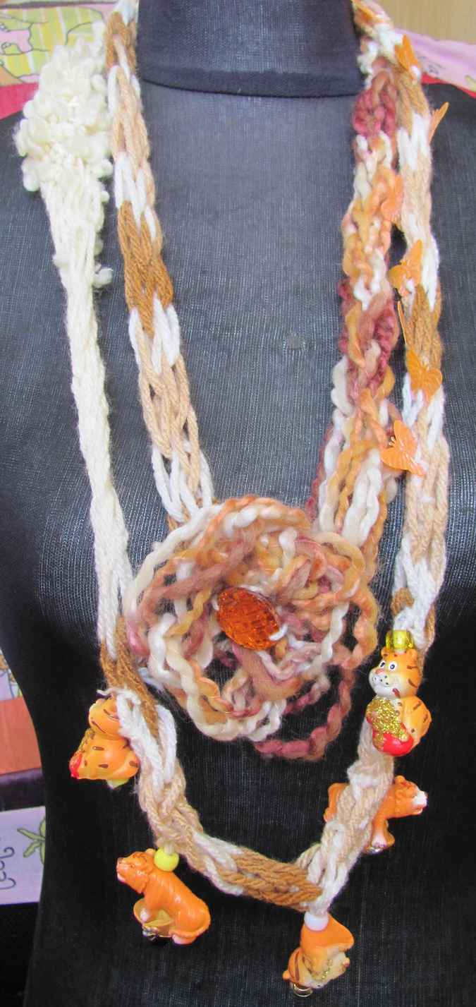large image of art item: accessory – necklace crochet orange white flower animals wooden