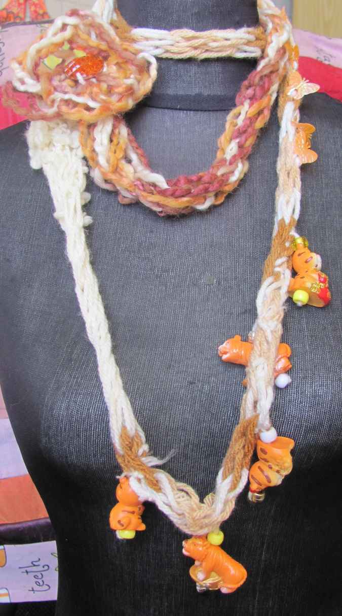 large image of art item: accessory – necklace crochet orange white flower animals wooden