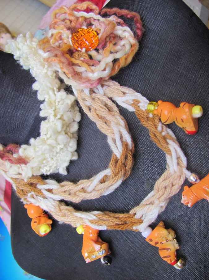 large image of art item: accessory – necklace crochet orange white flower animals wooden
