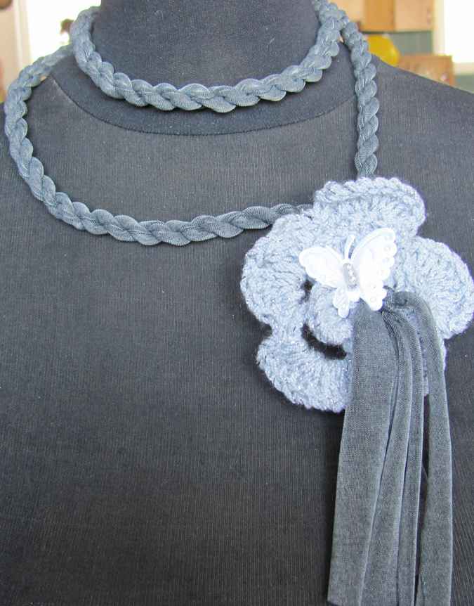 large image of art item: accessory – necklace gray crochet flower butterfly