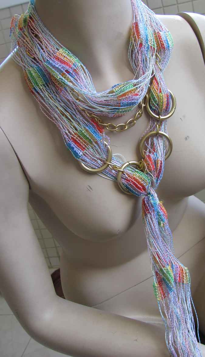 large image of art item: accessory – necklace rings golden threads colorful
