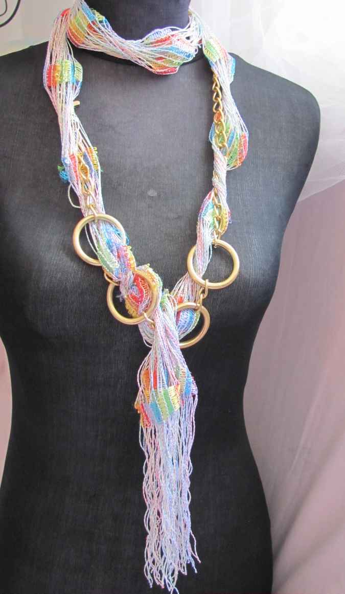 large image of art item: accessory – necklace rings golden threads colorful