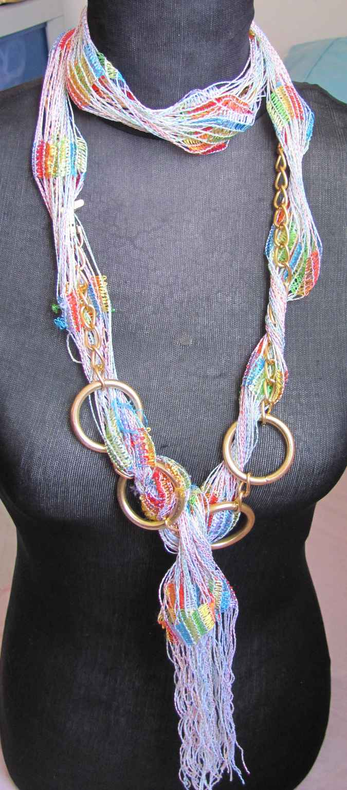 large image of art item: accessory – necklace rings golden threads colorful