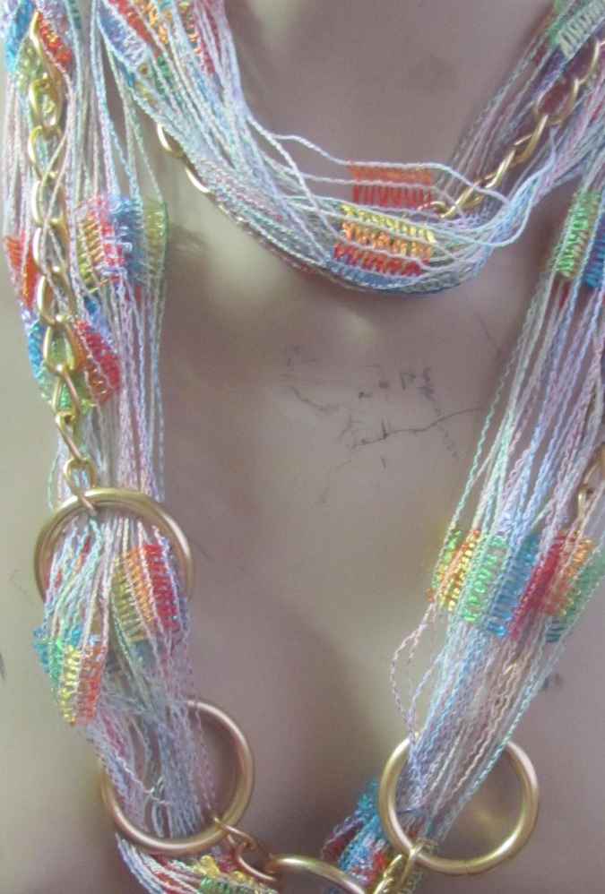 large image of art item: accessory – necklace rings golden threads colorful