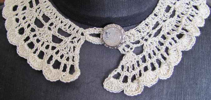 large image of art item: accessory – necklace silver and crystal button 
