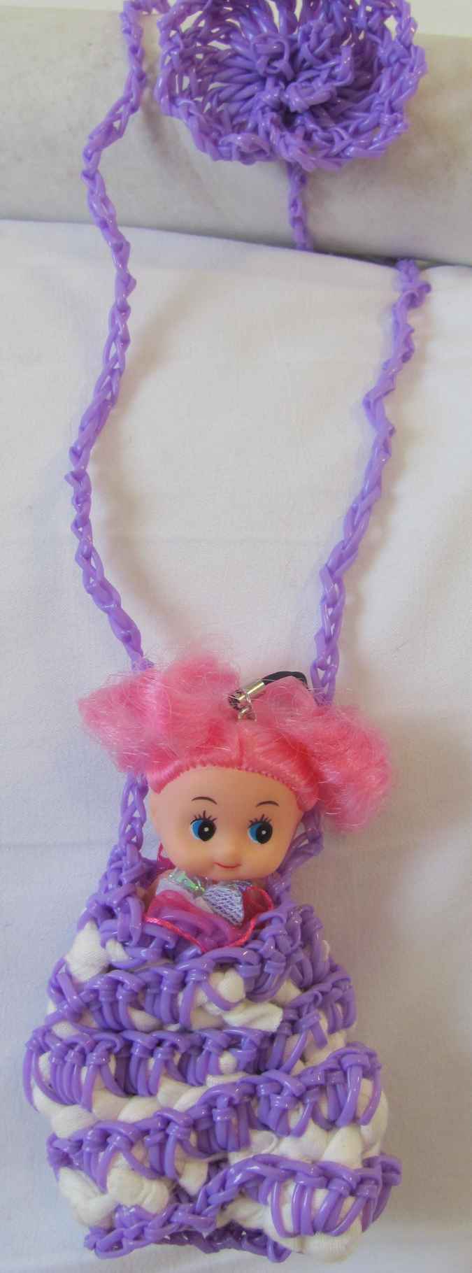 large image of art item: accessory – necklace purple doll