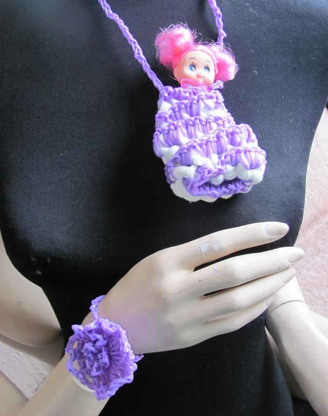 large image of art item: accessory – necklace purple doll