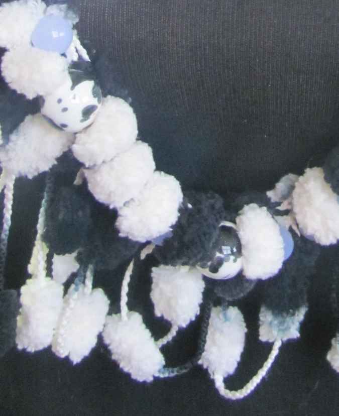 large image of art item: accessory – ponpons black and white golden chain
