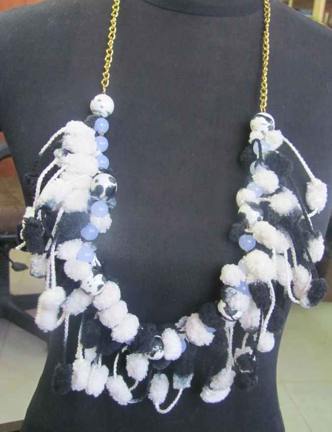 large image of art item: accessory – ponpons black and white golden chain