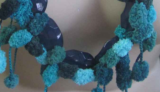 large image of art item: accessory – ponpons cyan crystals black