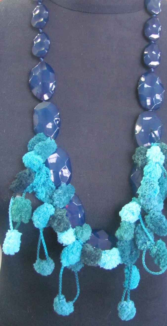 large image of art item: accessory – ponpons cyan crystals black