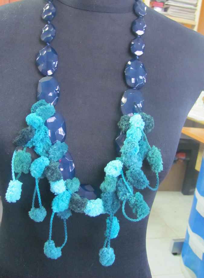large image of art item: accessory – ponpons cyan crystals black