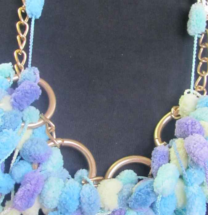 large image of art item: accessory – ponpons cyan golden chain and rings