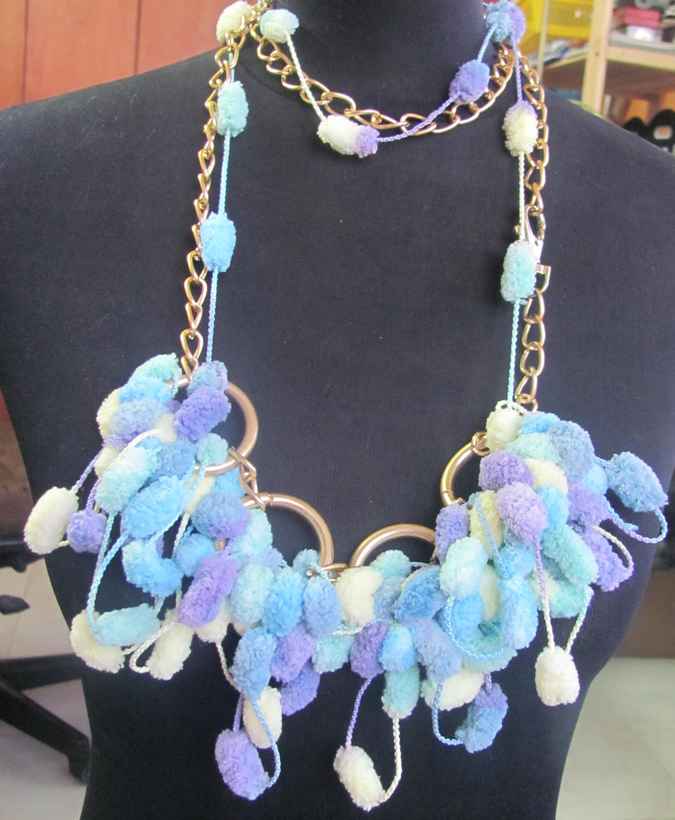 large image of art item: accessory – ponpons cyan golden chain and rings