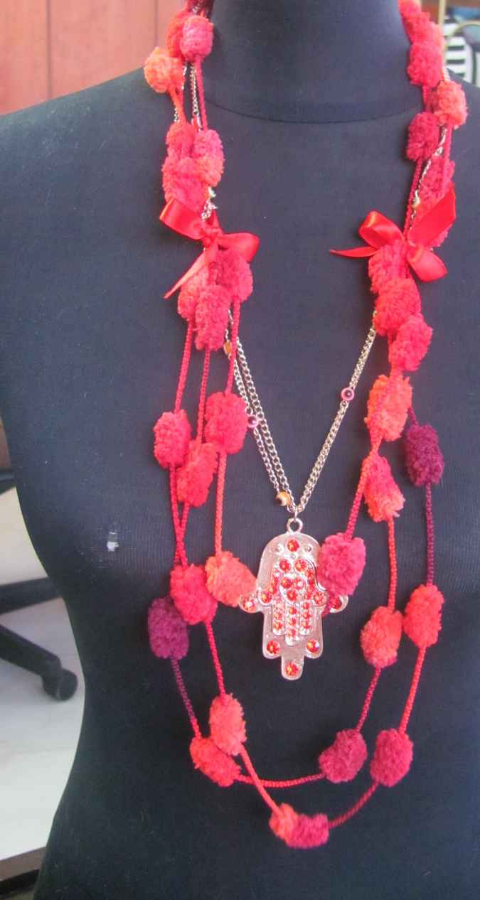 large image of art item: accessory – ponpons red