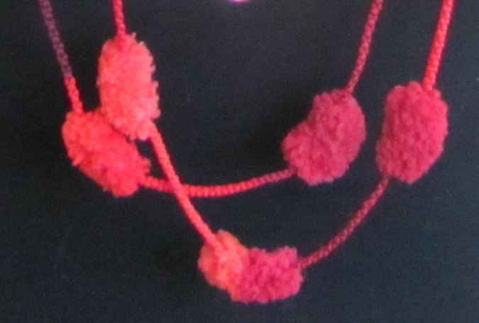 large image of art item: accessory – ponpons red