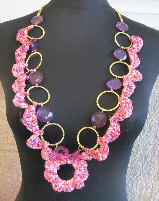 large image of art item: accessory – chestpiece necklace crochet pink rings gold