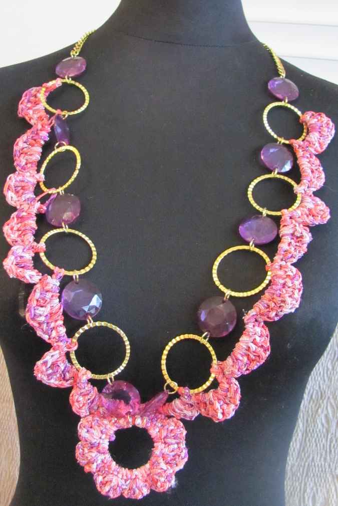 large image of art item: accessory – chestpiece necklace crochet pink rings gold