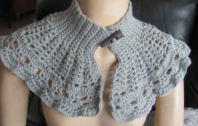 large image of art item: accessory – capeletgray longbutton