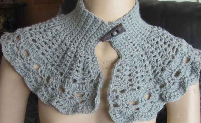 large image of art item: accessory – capeletgray longbutton