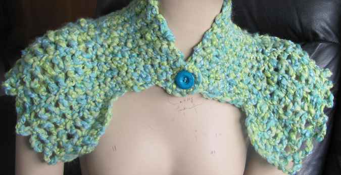 large image of art item: accessory – capelet crochet green with button