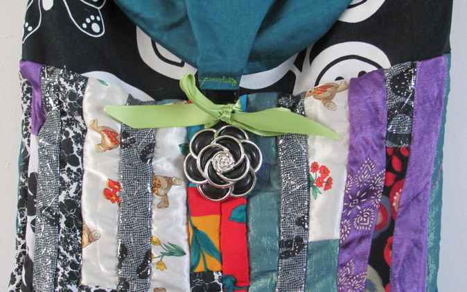 large image of art item: bag – black motif butterfly and plant colurful quiltwork