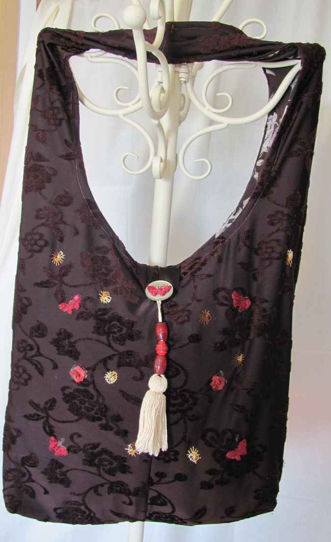 large image of art item: bag – brown motif flower black butterfly red
